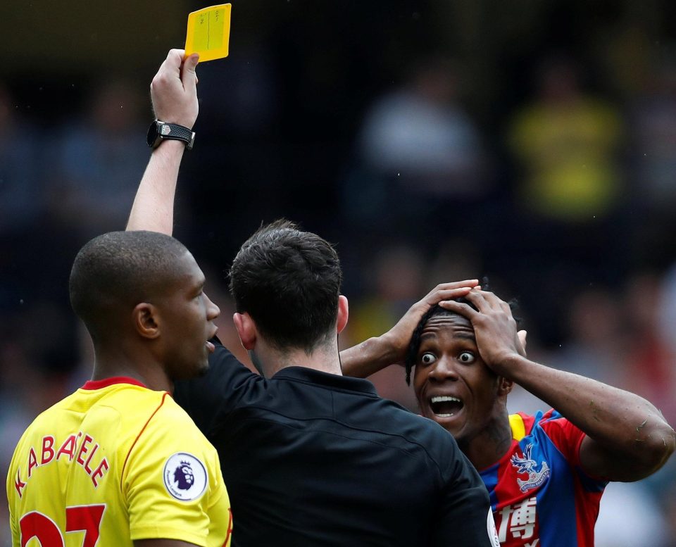  A disbelieving Zaha did pick up a yellow card from ref Chris Kavanagh