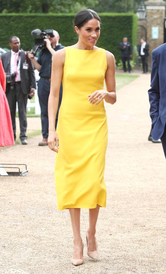  Meghan dazzled in this yellow Brandon Maxwell midi