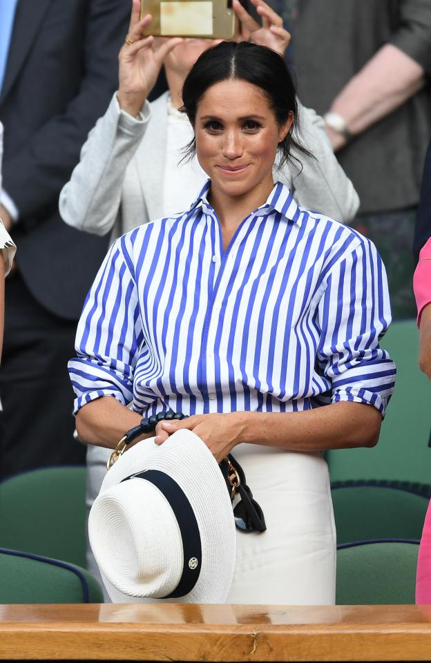  Meghan looked beautiful in a striped shirt for her outing to Wimbledon in July