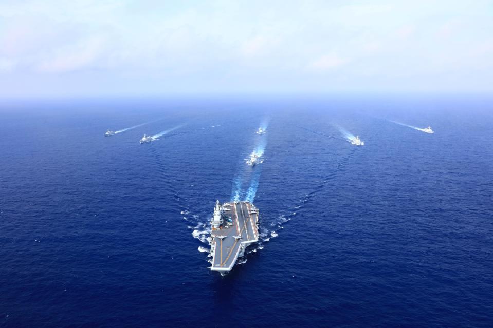  A PLA Navy fleet including the aircraft carrier Liaoning, vessels and fighter jets take part in a drill in April 2018 in the South China Sea