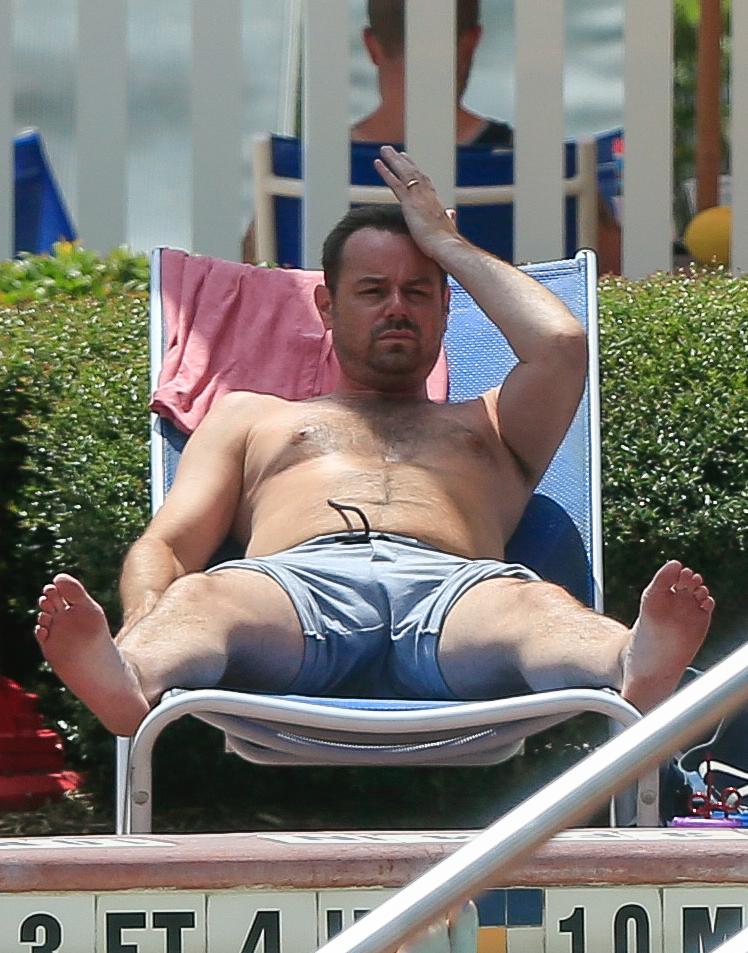  The EastEnders' star was seen relaxing on a sun lounger in the shade