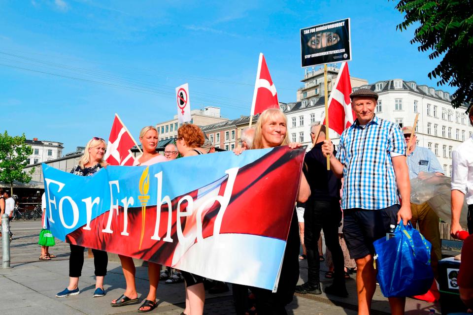  The banner being held at the pro ban demo read "For Frihed" meaning "For Freedom"