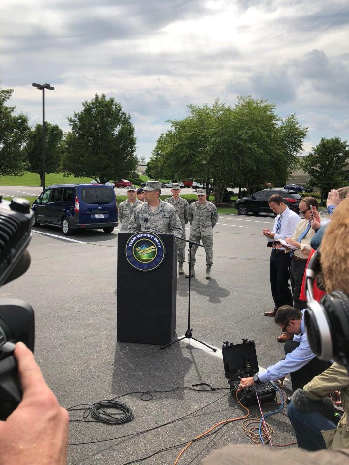  Colonel Tom Sherman, base commander, 88th Air Base Wing addresses the media