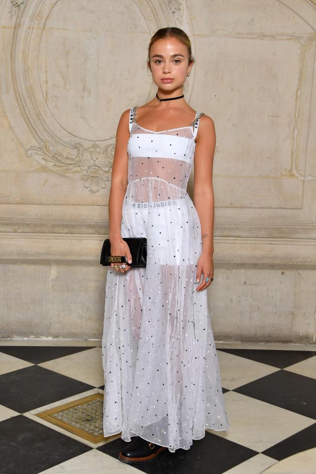  Amelia poses in a see-through, sheer dress at the Paris Fashion Week Christian Dior show