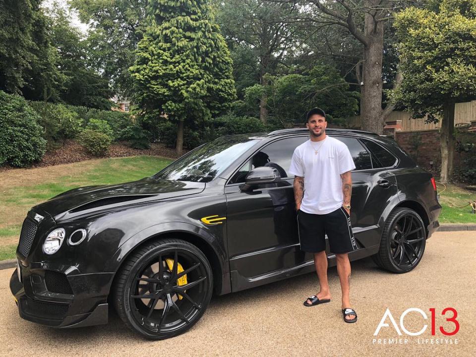 Kyle Walker poses with his transformed Bentley Bentayga