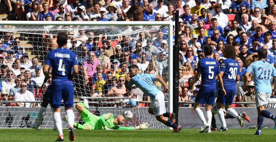 Sergio Aguero sees his shot nestle in the bottom corner with Willy Caballero well beaten