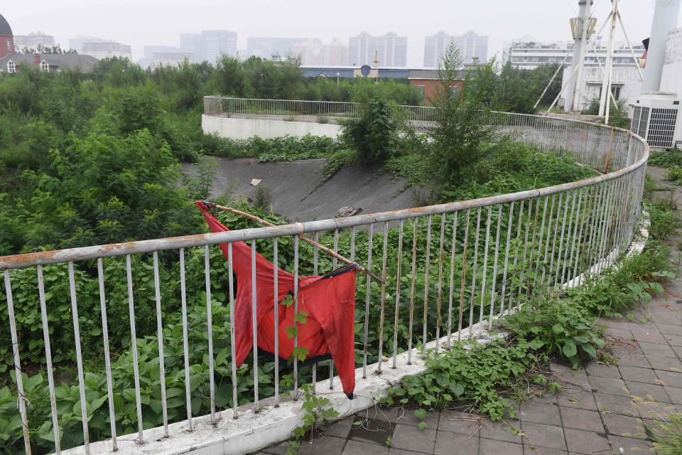 The arenas used at the Beijing Games of a decade ago are now little more than weeds and memories