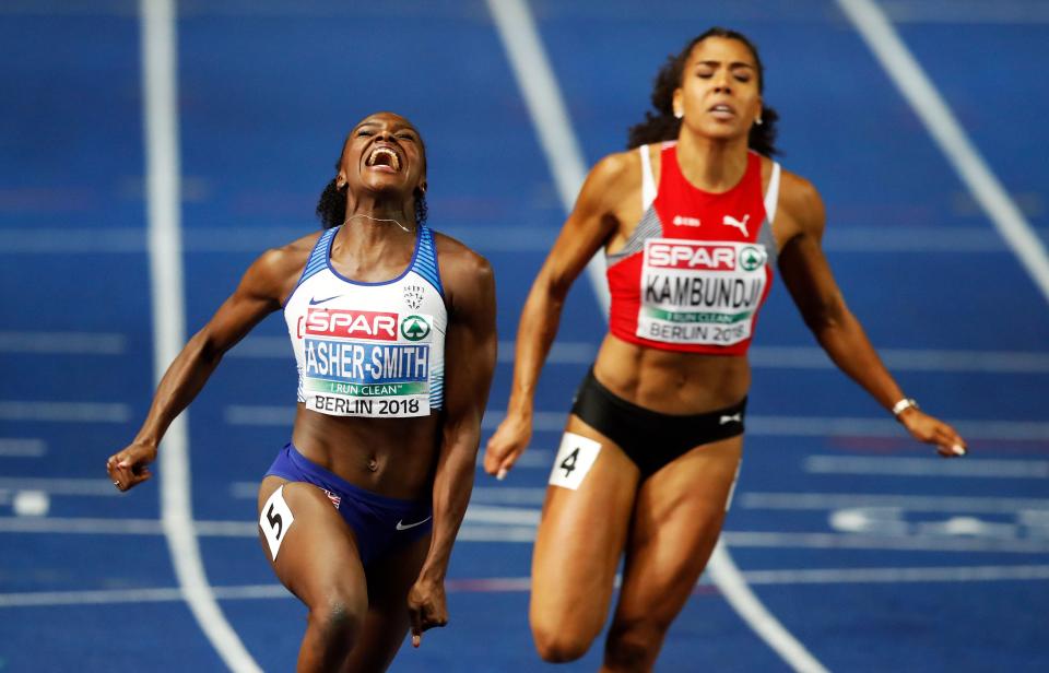 Dina Asher-Smith crosses the line in a British record time of 10.85sec to clinch European gold