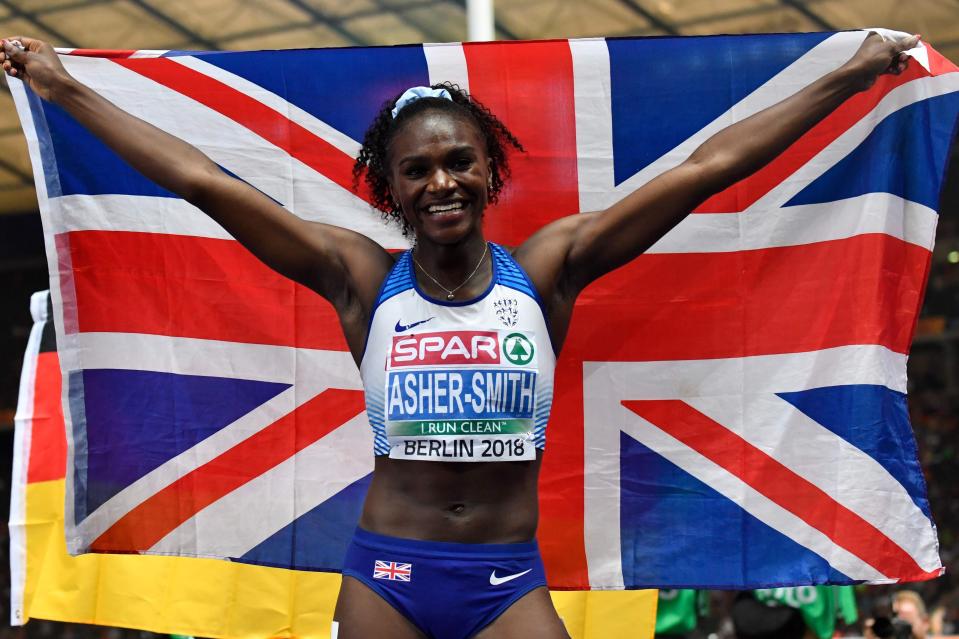 Asher-Smith holds the Union Jack high after winning gold in Berlin