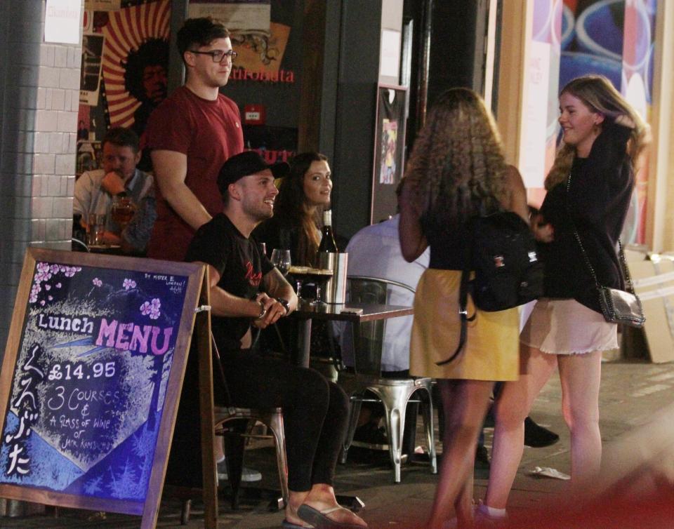  Charlie Brake held court with female fans during a dinner with friends in London