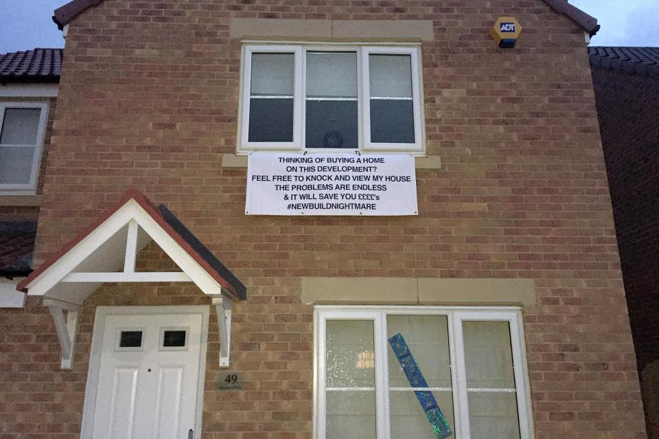  Mike Firth plastered his new home with a warning to other buyers