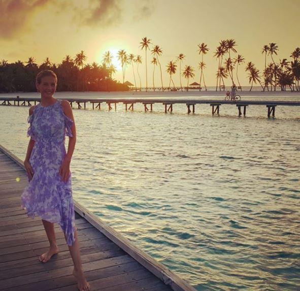 Our personal favourite, Rachel wears a floaty blue dress in The Maldives