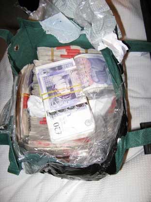  Detectives found £100,000 at Gard's home