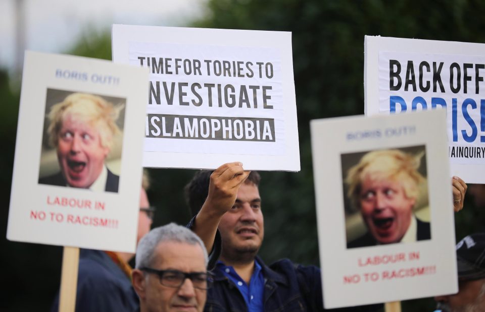  Local people protest outside the Hillingdon Conservative Association office in Uxbridge