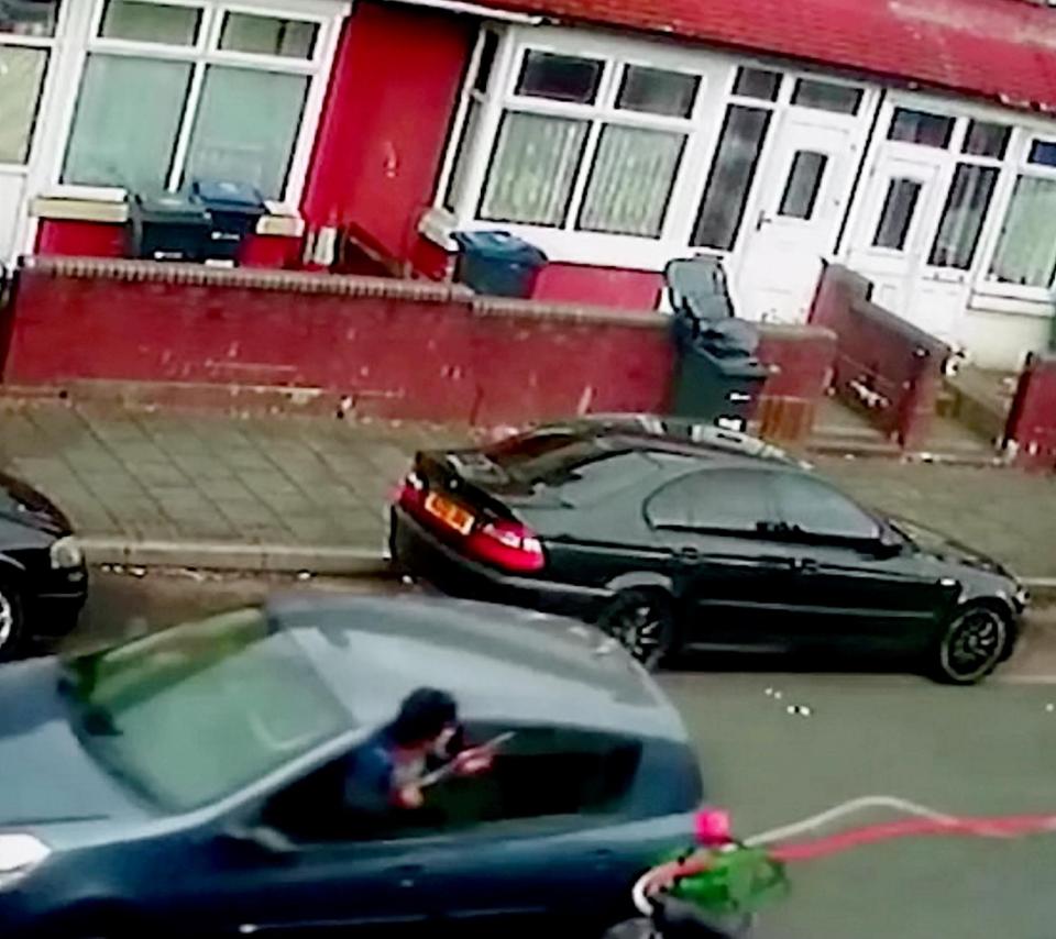  The chilling moment a gunman opened fire during a car chase in Birmingham