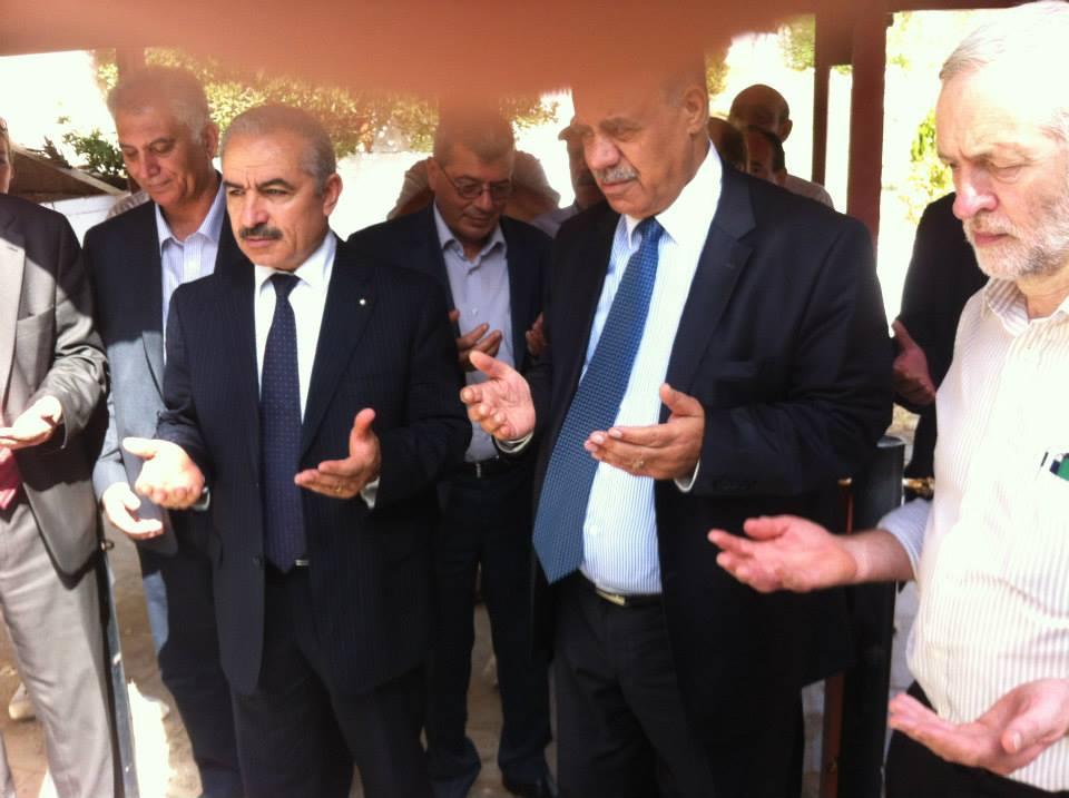  The Labour leader is seemingly joining in an Islamic prayer at the graveside in this picture