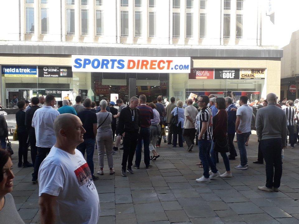 Newcastle fans gathered to chant against Mike Ashley and wave banners