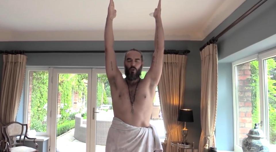  Russell Brand demonstrates yoga exercises in his YouTube videos