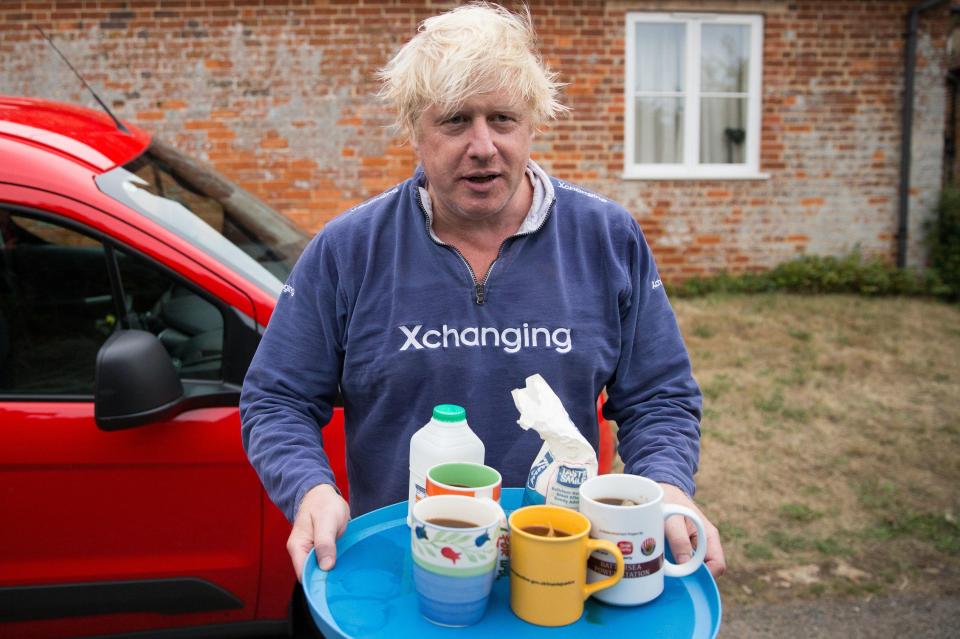  Boris Johnson brought cups of tea to reporters outside his Oxfordshire his home who were waiting to quiz him over his controversial burka comments