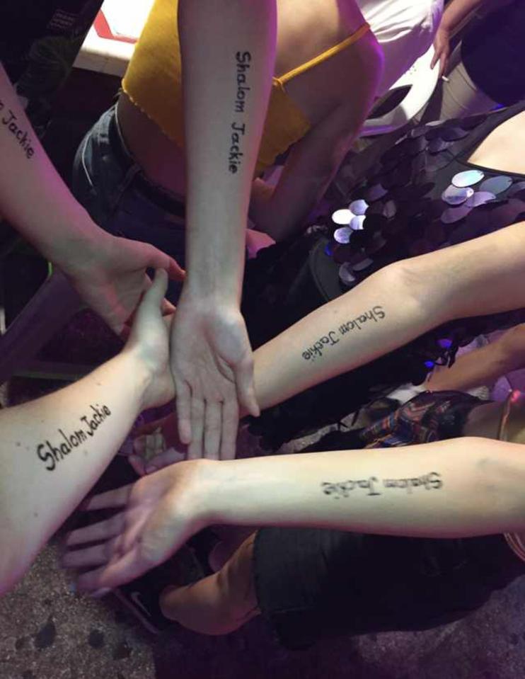  The group of eight pals thought it would be fun to get the black henna tattoos done after the quote became a bit of a catchphrase on holiday