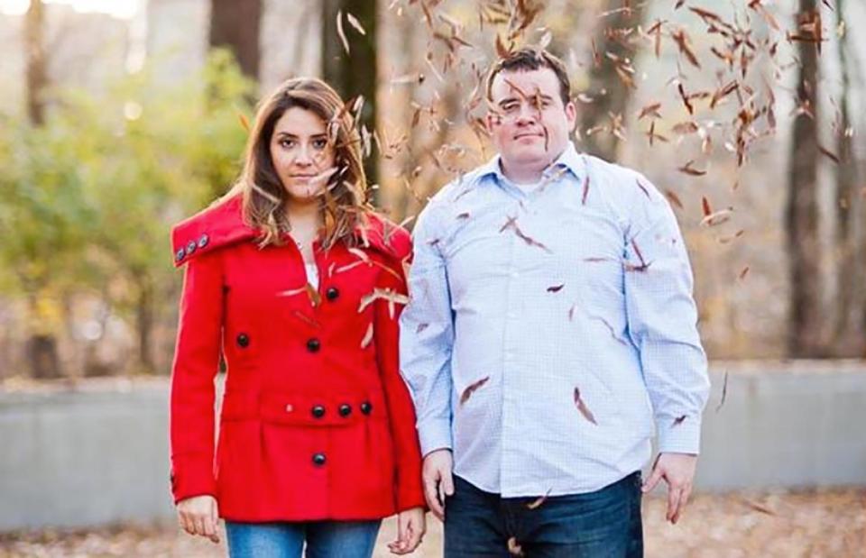  This nature loving pair were snapped in a flurry of Autumnal leaves for their engagement photo