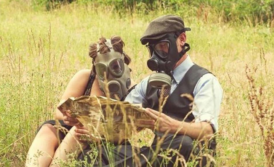  In one bizarre photo, this couple donned matching gas masks for their engagement shot