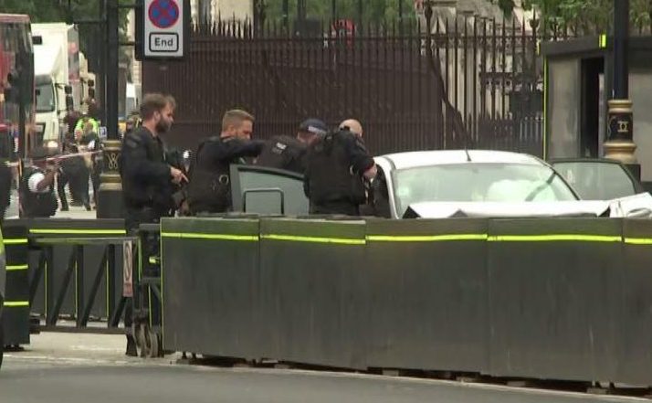  The crashed car can be seen with a crushed bonnet after colliding with security barriers