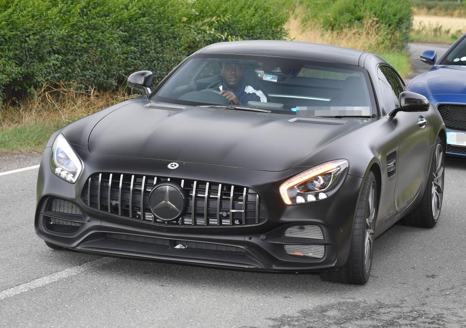 The striker rocked up to work in a new £102k black Mercedes AMG-GT Coupe