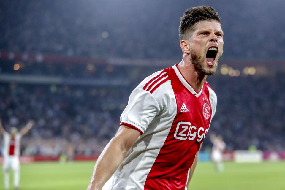  Klaas-Jan Huntelaar celebrates scoring Ajax's first goal against Standard Liege last night