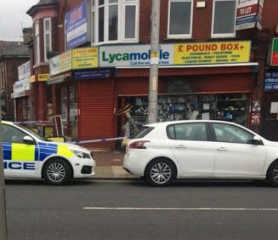  Three men stormed his store in Greater Manchester on Tuesday afternoon