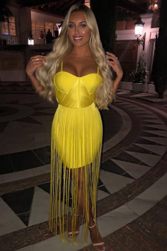 Amber Turner wears bright yellow on holiday in Greece