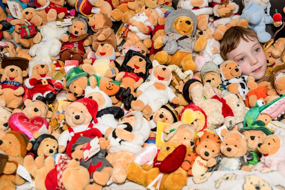  Vicky's son William, five, hides among the bears. She wants to create more room for her sons' toys