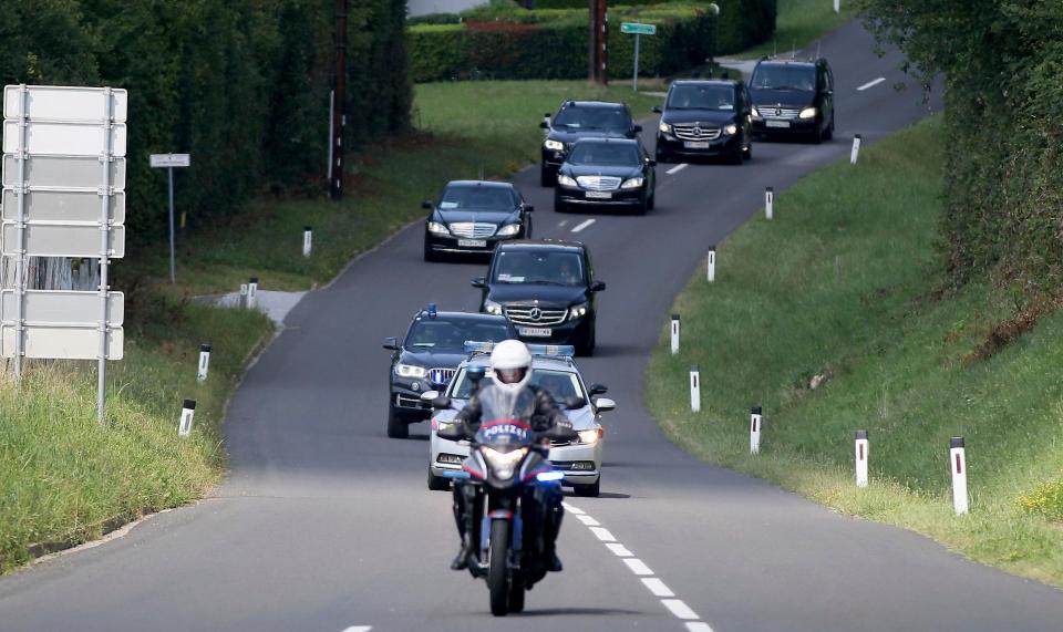  The car convoy of Russia's President Vladimir Putin arrives for the wedding