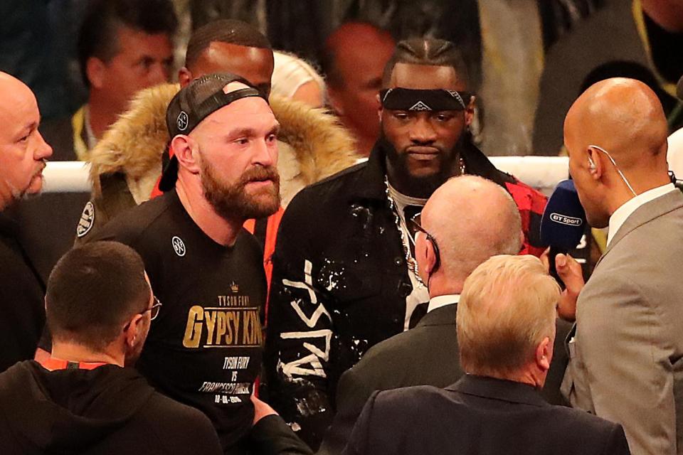  The Gypsy King and Wilder squared up inside the ring after Fury's win