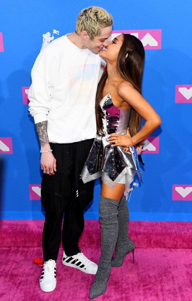  And they wouldn't let go of one another, with Ariana hanging onto the comedian