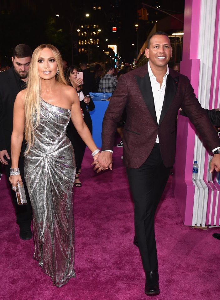  Earlier in the evening, Jennifer had arrived in a silver gown with boyfriend Alex Rodriguez