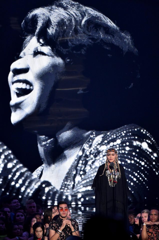  Madonna gave a rambling speech as Aretha's image was on screen behind her