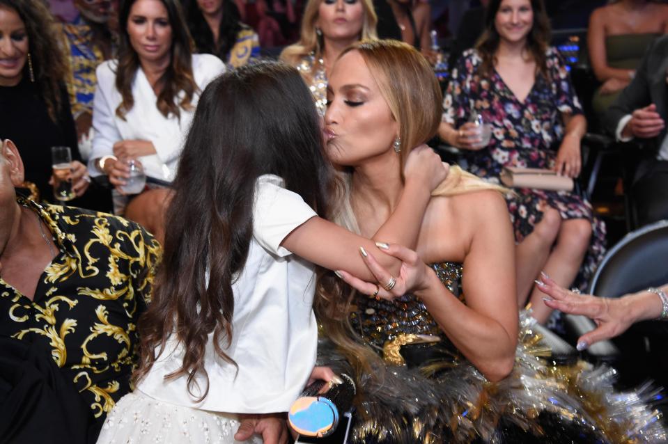  Emme gave her mother a kiss on her big night