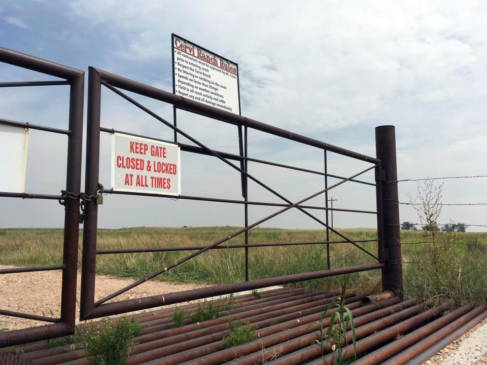  A locked gate at an entrance to a ranch in Colorado's eastern plains, near where police say the bodies of Shanann Watts and her daughters Bella and Celeste were discovered