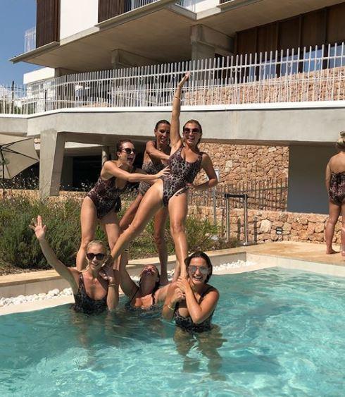  The 28-year-old is letting her hair down with her best friends in Ibiza