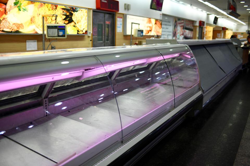  Supermarket shelves sit empty in the Venezuelan capital, Caracas