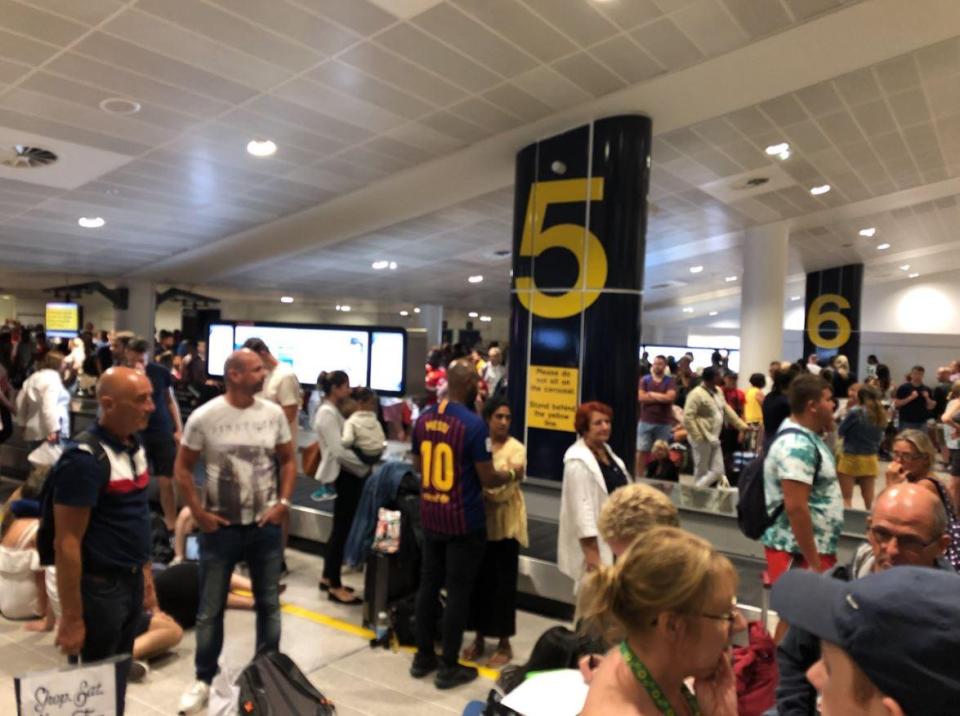  Passengers landing at Manchester Airport had to wait up to four hours for their luggage