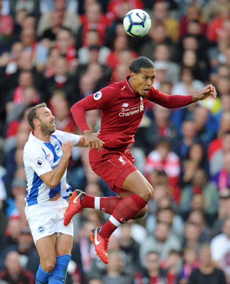  Virgil van Dijk and Glenn Murray contest for the ball during the opening period