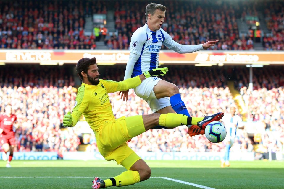  Liverpool goalkeeper Alisson made an expert challenge on Brighton ace Solly March