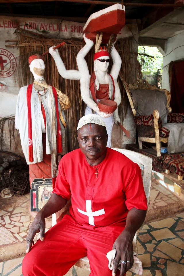  Witch doctor Okeh at a juju shrine. He insists he never helps traffickers