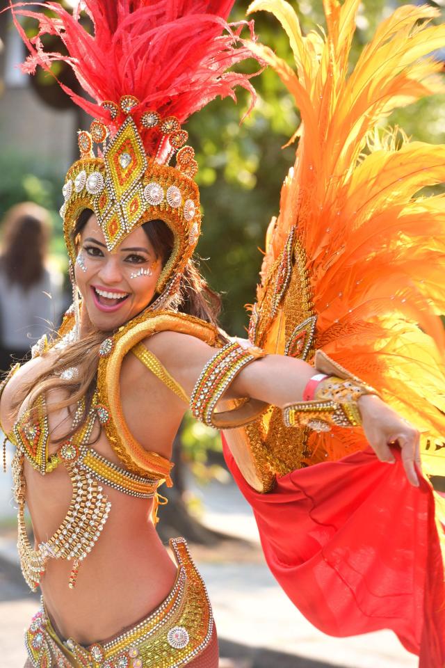  A dancer gets into the spirit of things at the West London festival