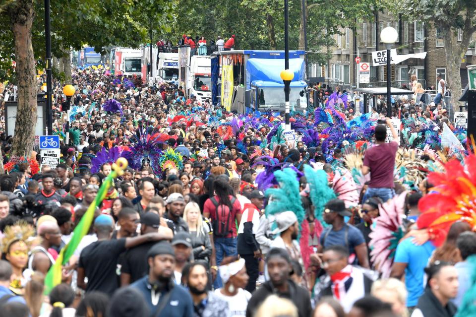  Crowds descend on the streets of Notting Hill to soak up the carnival atmosphere