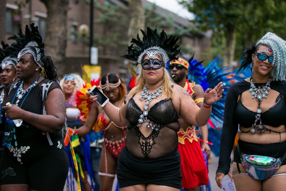  Masked performers dance at the festival