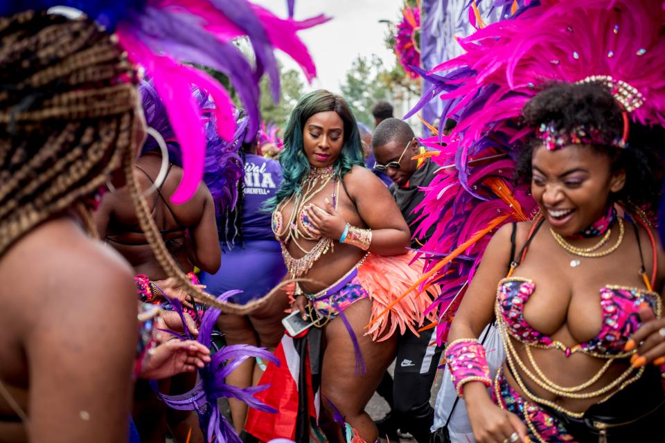  Colourful dancers give the crowds a treat