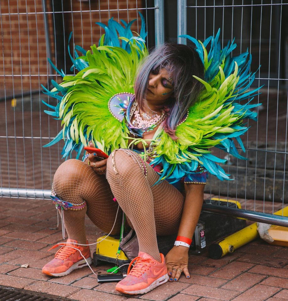  A dancer takes a break from the festivities for a moment